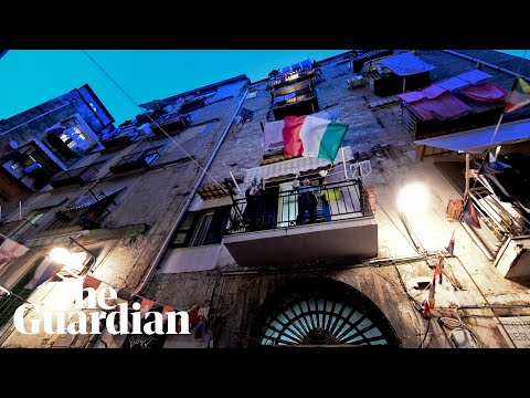 Coronavirus: quarantined Italians sing from balconies to lift spirits